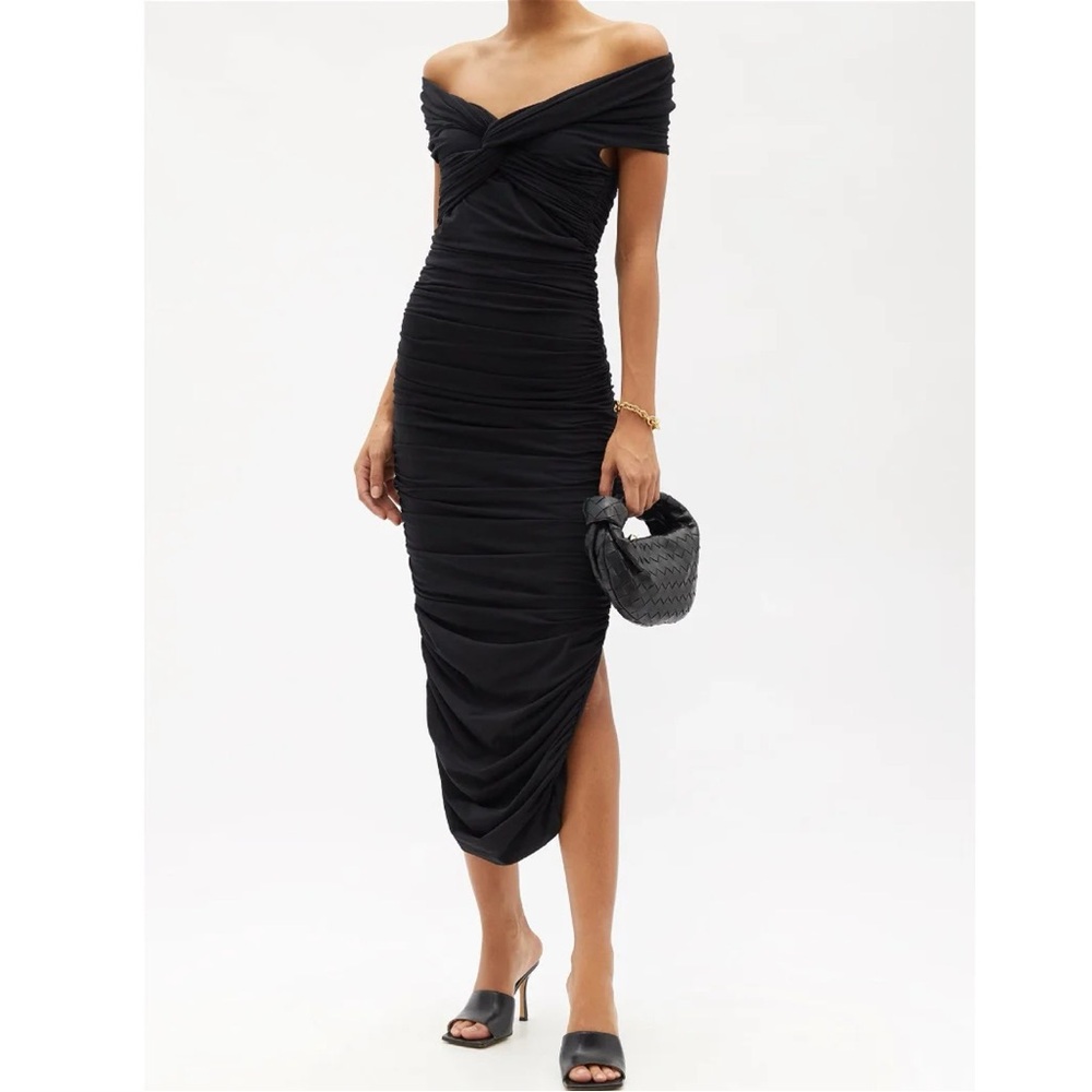 KHAITE Spence ruched fitted off the shoulder midi dress in black